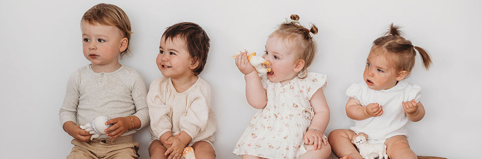 Small children with ChaBil colourful, playful, cute teething toys.